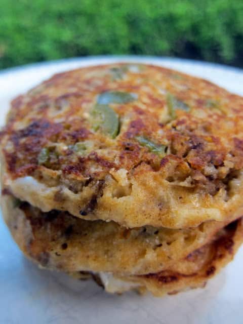 Taco Pancakes Recipe - cornmeal pancakes stuffed with taco meat, jalapeños and cheese - top with salsa, lettuce and sour cream - fun twist to taco night! Fun Mexican food!