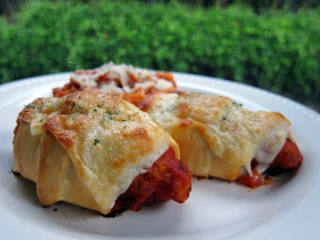 Chicken Parmesan Crescents Recipe - frozen chicken tenders, spaghetti sauce, mozzarella baked in refrigerated crescent rolls - Ready in 20 minutes! Super quick lunch or dinner. 