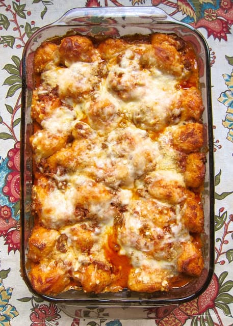 Bubble Up Lasagna - Italian sausage, spaghetti sauce, 3 cheeses tossed with chopped refrigerated biscuits - all the flavors of lasagna without all the work! I literally wanted to lick my plate! Precook the sausage and this dish is ready before the oven can preheat!