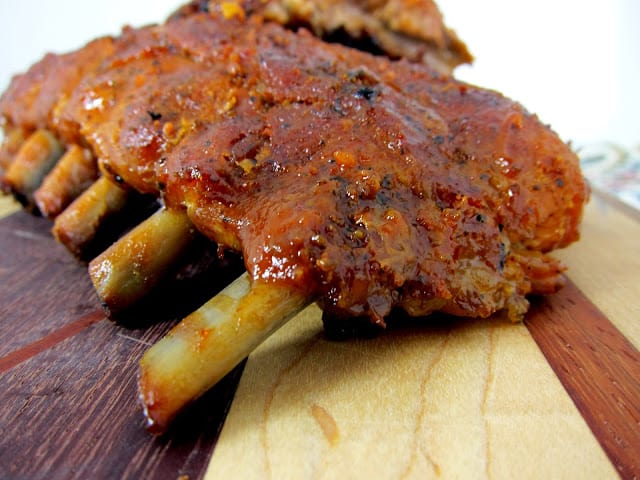 Fall Off the Bone Ribs Recipe - baby back ribs coated with a homemade BBQ rub and baked. Finish off on the grill with a homemade BBQ sauce. THE BEST! Better than any restaurant. We never order ribs out anymore. 