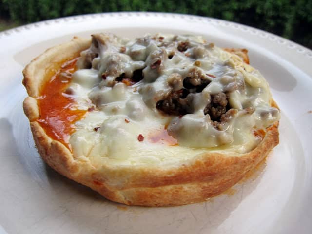 Pizza Pot Pie - place pizza topping and cheese in large ramekin, top with pizza crust and bake. Flip over to reveal a mini deep dish pizza! Easy to customize the ingredients! Fun twist to pizza night.