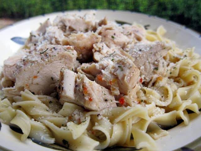 Crockpot Lemon Chicken - 5 simple ingredients! TONS of great flavor! We served this over egg noodles and poured the juices from the crockpot over it. SO good!! 