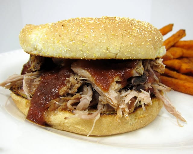 Slow Cooker Coca-Cola Pulled Pork with Coca-Cola BBQ Sauce - only 2 ingredients for the pulled pork! SO good. You have to make the BBQ sauce to go with this. Simple recipe, but SOOOO yummy!
