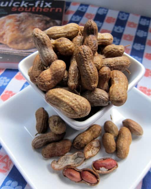 Slow Cooker Boiled Peanuts - raw peanuts, water and salt - put in the slow cooker and let simmer overnight. Add seasonings to water - great with crab boil seasoning, jalapeños and cajun seasoning! Perfect for summer BBQs and football tailgating!