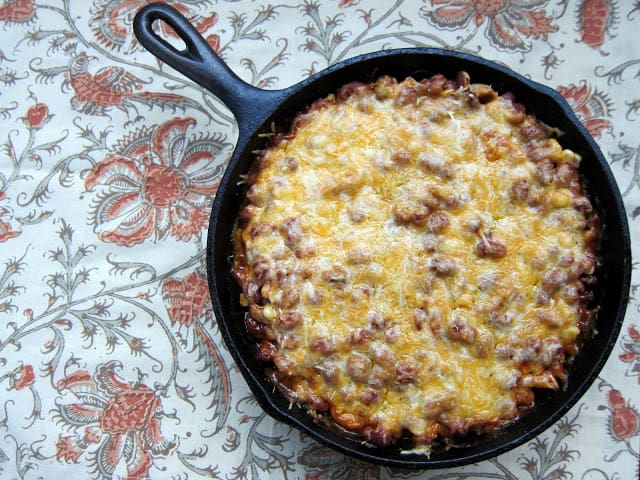 Quick Tamale Pie - premade polenta, chicken, beans, corn, salsa and cheese. Bakes in an iron skillet for 30 minutes. Quick Mexican Casserole Recipe