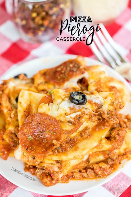 Pizza Pierogi Casserole - family friendly weeknight dinner!! Super easy to make and tastes AMAZING!! Can make ahead and freeze for later. Top casserole with your favorite pizza toppings - get creative! Frozen pierogis, italian sausage, spaghetti sauce, pepperoni, mozzarella cheese. Everyone cleaned their plate and went back for seconds! Weeknight dinner SUCCESS!!!