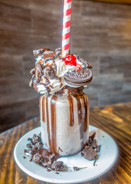 Cookies & Cream Milkshake at Prohibition Kitchen - Where to Eat in St. Augustine, Florida - we found several hidden gems in St. Augustine that you MUST try on your next trip. Pizza, Burgers, Sandwiches, Craft Cocktails, and CRAZY milkshakes! Something for everyone!!