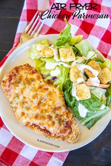 Air Fryer Chicken Parmesan - all the flavor and none of the fat! I am OBSESSED with this crunchy and delicious chicken! SO easy to make and ready in about 10 minutes. Chicken cutlets, eggs, flour, Italian breadcrumbs, panko breadcrumbs, parmesan cheese, spaghetti sauce and mozzarella cheese. Serves with a simple side salad and dinner is done! #airfryer #chicken