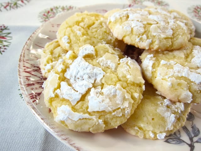 Almond Cream Cheese Crinkles - SO good! Only 6 ingredients - Cake mix, egg, butter, almond extract, cream cheese and powdered sugar. Took these to a cookie swap and everyone raved about them. One of my favorite Christmas cookies. SO easy and SO delicious!