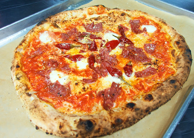 Diavola Pizza at Antico Pizza in Atlanta, GA topped with spicy sopressata, pepperonata, bufala