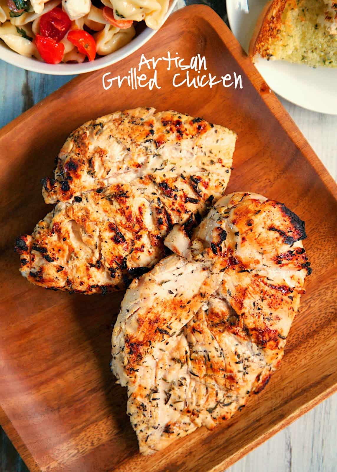 Artisan Grilled Chicken Recipe - chicken marinated in garlic, onion, thyme, sugar, salt, honey and lemon juice - SO flavorful! LOVED the hint of sweetness from the honey. You may want to double the recipe for leftovers.