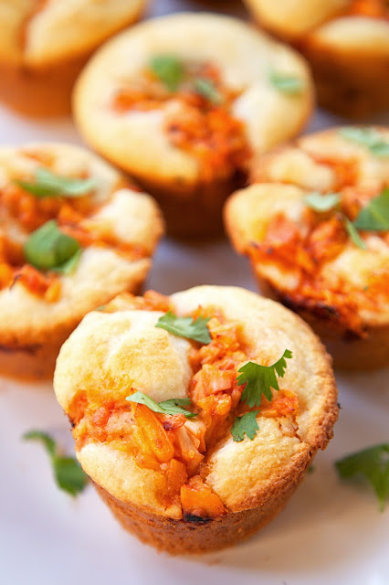 BBQ Chicken Cornbread Muffins - only 5 ingredients and ready to eat in under 30 minutes! Martha White Buttermilk Cornbread Mix, milk, cooked chicken, BBQ sauce and cheddar cheese. Top muffins with extra BBQ sauce and cilantro. SO good! The whole family gobbled these up! They have already been requested again for dinner. 