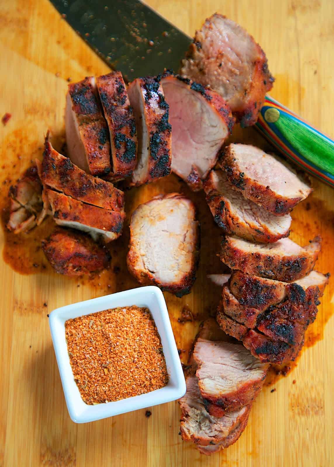 BBQ Pork Tenderloin Recipe - pork tenderloin seasoned with a homemade BBQ rub and grilled. Tasted SO good! Great on its own or on a bun with BBQ sauce!