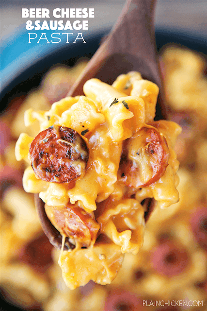Beer Cheese and Sausage Pasta -CRAZY good! Ready in 15 minutes! Smoked sausage and pasta tossed in a quick homemade beer cheese sauce. Smoked sausage, pasta, beer, cheese, flour, worcestershire sauce, dry mustard and paprika. Tastes just like the beer cheese sauce from our favorite Irish pub. Great weeknight meal!