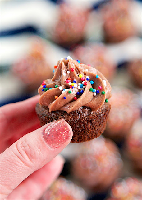 Brownie Batter Frosting - only 4 ingredients to the most AMAZING frosting! Great on brownie bites, cupcakes, cakes or a spoon!! Ready in about 5 minutes. Can refrigerate or freeze for later!