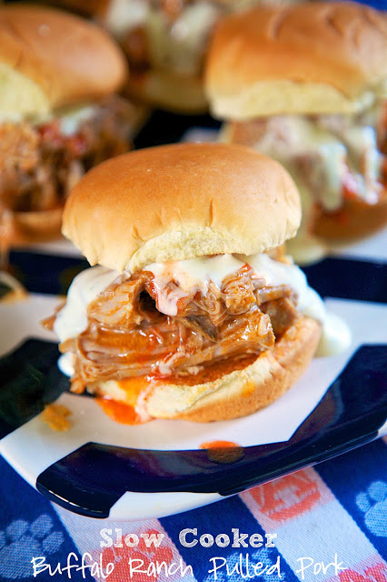 Slow Cooker Buffalo Ranch Pulled Pork - throw 3 ingredients into the slow cooker and let it do all the work. Great for tailgating or an easy lunch or dinner. Serve on slider buns or over nachos or rice. Can freeze leftovers!