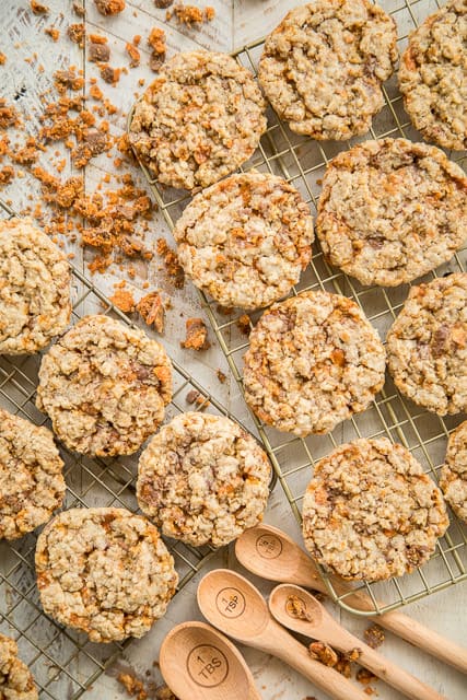 Butterfinger Oatmeal Cookies - seriously AMAZING cookies! Crispy on the outside and chewy on the inside. I had zero self-control around these cookies! ZERO!!! I ate WAY too many! Shortening, brown sugar, sugar, egg, water, vanilla, flour, salt, baking soda, quick-cook oats and Butterfinger baking bits. TO-DIE-FOR!! Make these ASAP!