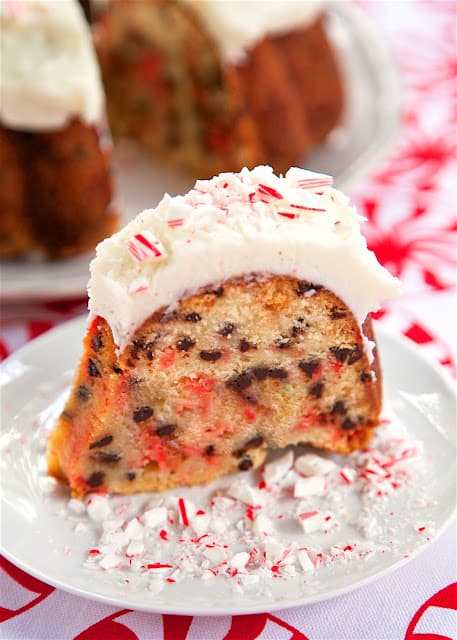 Candy Cane Chocolate Chip Pound Cake - homemade pound cake loaded with crushed candy canes and chocolate chips and topped with a quick homemade peppermint buttercream - AMAZING! Definitely going on our holiday table!