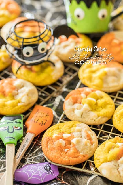 Candy Corn White Chocolate Chip Cookies - fun, festive Halloween themed cookies. THE BEST chocolate chip cookie EVER! I ate WAY too many of these!! Shortening, bread flour, salt, sugar, brown sugar, eggs, vanilla, white chocolate chips, gel food coloring. Can make cookies with regular chocolate chips. You can also skip the food coloring if you aren't making for halloween. Seriously THE BEST cookie recipe!!!