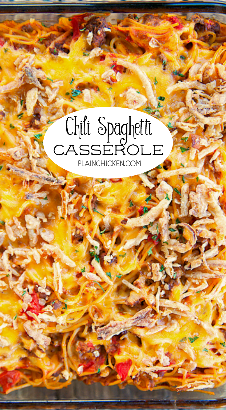 Chili Spaghetti Casserole - comfort food at its best! Spaghetti, hamburger, onions, garlic, chili, tomatoes, sour cream, shredded cheese and French fried onions. CRAZY good!!! Ready to eat in under an hour. Great for a potluck and tailgating! Can freezer or later.