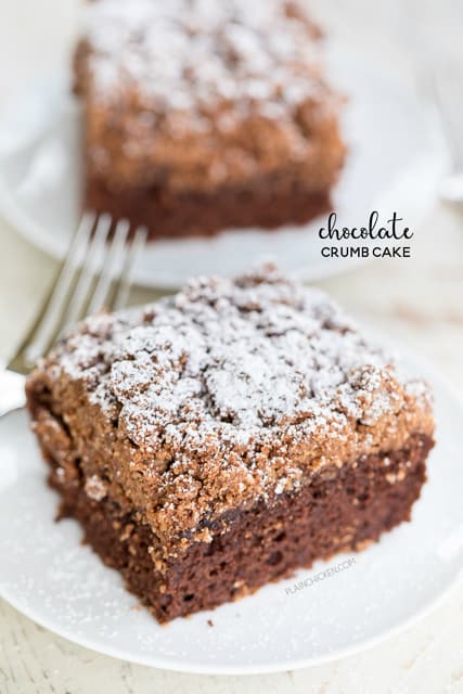 Chocolate Crumb Cake - chocolate cake mix topped with an easy homemade crumb topping. Chocolate cake mix, sugar, brown sugar, cinnamon, butter and cake flour. Super easy to make and tastes great. This cake is OUTRAGEOUSLY good! I could not stop eating it! Great for a crowd. We ate this for breakfast and dessert.