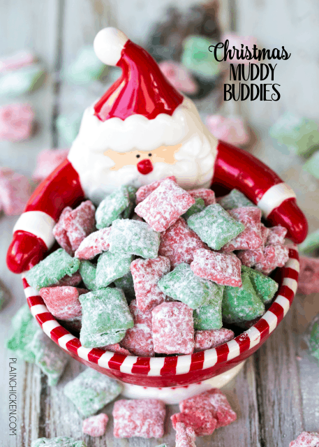 Christmas Muddy Buddies - chex cereal tossed in peanut butter, red and green candy melts and powdered sugar. This stuff is SO good! I am totally addicted to it!! This recipe makes a TON! Makes a great homemade gift for the holidays!