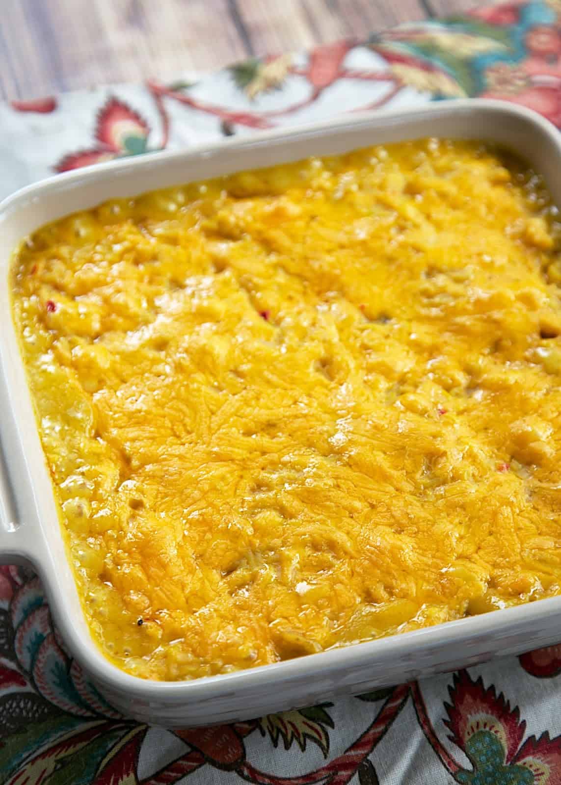 Corn and Rice Casserole - only 4 ingredients! Corn, Rice, Soup & Cheese. It is THE BEST corn casserole I've ever eaten! Can be made ahead of time. Quick side dish recipe!