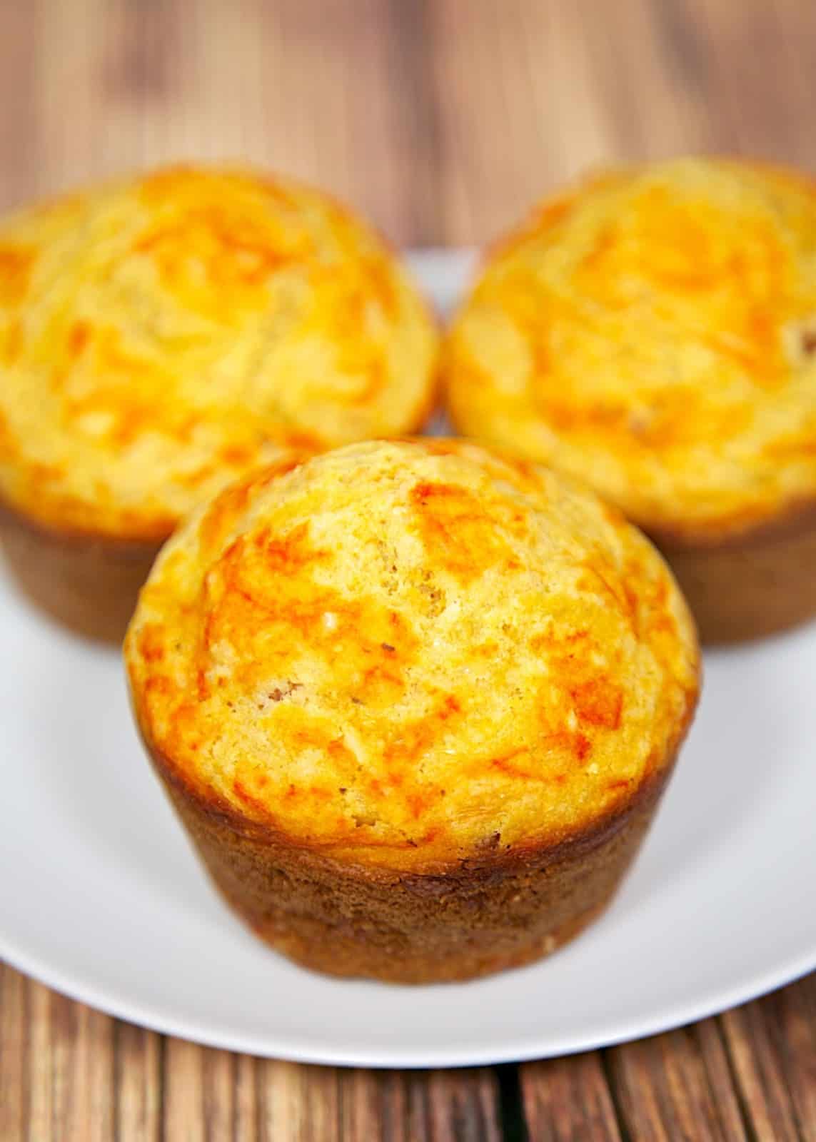 Bacon & Sriracha Corn Muffins Recipe - homemade corn muffins with bacon and a swirl of Sriracha. Great with soups, stews and grilled meats.