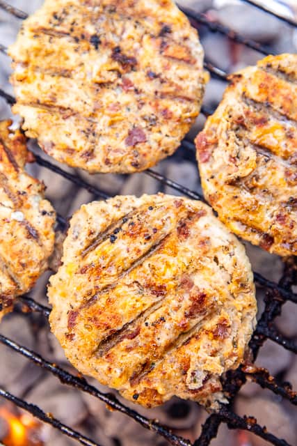 chicken burger patties on the grill