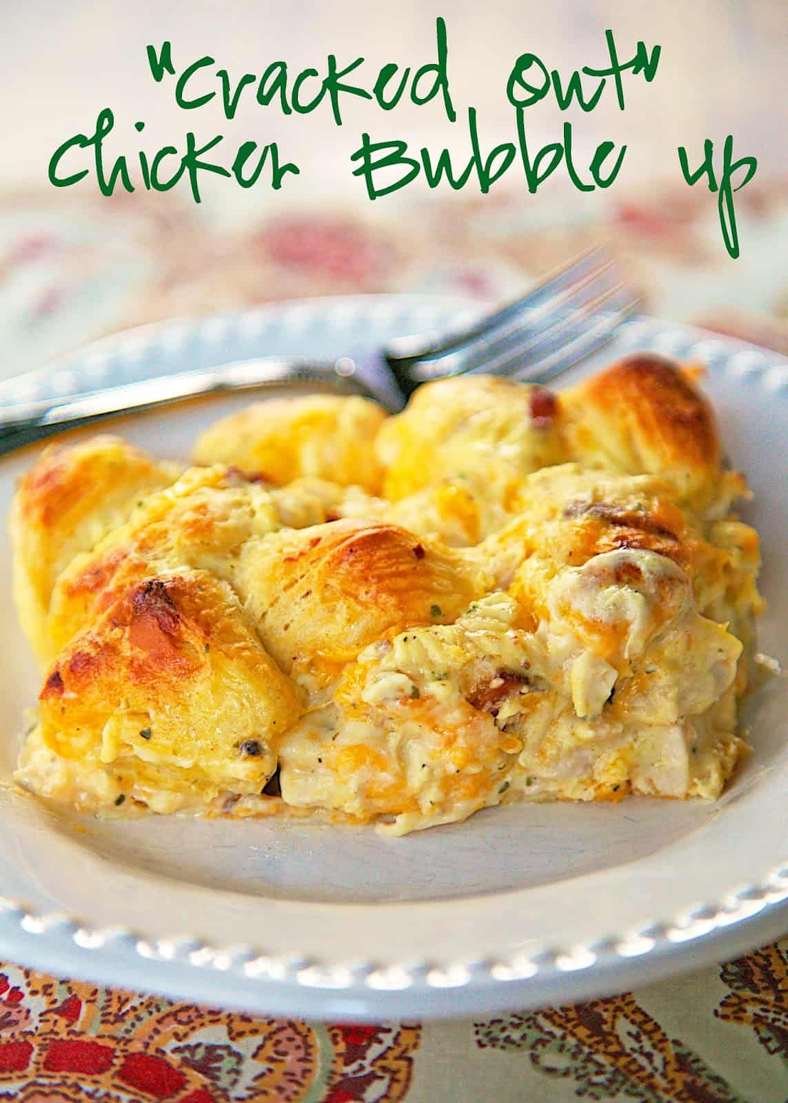 "Cracked Out" Chicken Bubble Up Recipe - chicken, cheddar bacon, ranch, chicken soup, sour cream and biscuits baked casserole. SO addictive! I literally licked my plate!
