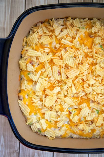 "Cracked Out" Hot Chicken Salad - baked chicken salad loaded with cheddar, bacon and ranch! Chicken, mayonnaise, celery, lemon juice, cheddar cheese, worcestershire, bacon, ranch dressing mix, potato chips. SOOO good! Can make ahead of time and refrigerate until ready to serve. Great for a quick brunch, lunch or dinner.