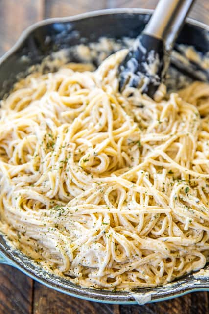 Creamy Noodles - a quick and easy side dish! Ready to eat in about 15 minutes! Spaghetti, cream cheese, milk, parmesan, garlic, butter, cajun seasoning, onion, and parsley. Goes with everything! Steak, chicken, pork. Great side dish or meatless main dish! #pasta #sidedish