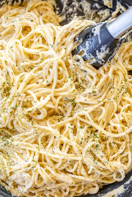 Creamy Noodles - a quick and easy side dish! Ready to eat in about 15 minutes! Spaghetti, cream cheese, milk, parmesan, garlic, butter, cajun seasoning, onion, and parsley. Goes with everything! Steak, chicken, pork. Great side dish or meatless main dish! #pasta #sidedish