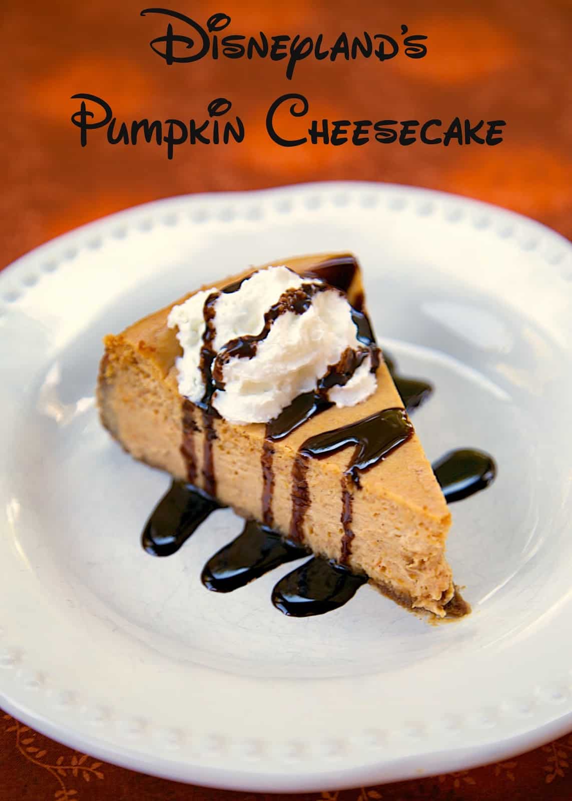 Disneyland's Pumpkin Cheesecake Recipe - great dessert for the holidays. Ready for the oven in 20 minutes. SO delicious! Biscoff cookie crust filled with cream cheese, sugar, pumpkin, eggs, evaporated milk, cinnamon and nutmeg. Even pumpkin haters LOVED this delicious cheesecake recipe!