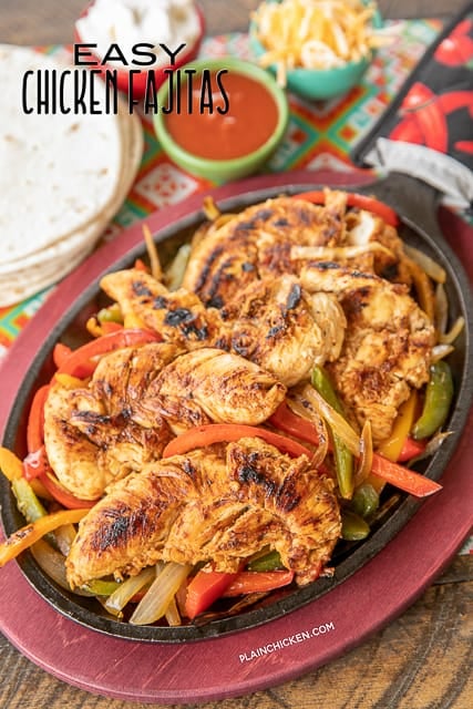 Easy Chicken Fajitas - SO much better than the Mexican restaurant and only 5 ingredients! We make these every week - great meal prep recipe! Chicken, Italian dressing, diced tomatoes and green chiles, taco seasoning and lime. Let the chicken marinate overnight and quickly cook in the skillet. Add onions and peppers for an authentic Mexican restaurant taste. SO easy and SO good! #mexican #chicken #chickenfajitas #mealprep
