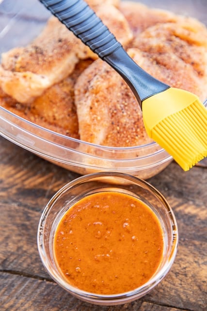 chipotle basting sauce with seasoned chicken