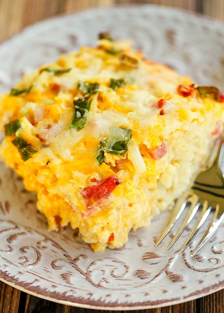 Overnight Ham and Cheese Hashbrown Breakfast Casserole - hash browns, cheese, ham, green onions, eggs, evaporated milk - mix together and refrigerate overnight for a quick breakfast. Great for overnight guest and the upcoming holidays!
