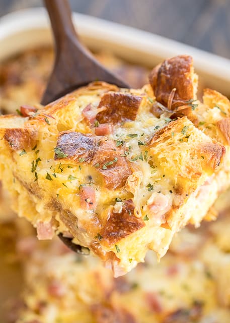 Ham & Cheese Croissant Casserole - love this overnight breakfast casserole! Ham, croissants, swiss cheese, eggs, half-and-half, dry mustard, honey, salt and pepper. Assemble the night before and bake in the morning. Great way to use up any leftover holiday ham!! #casserole #breakfast #croissant #makeaheadcasserole