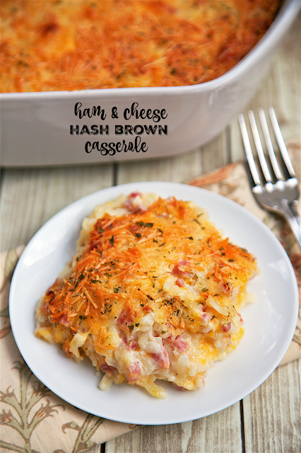 Ham and Cheese Hash Brown Casserole - only 6 ingredients!! Hash browns, ham, parmesan cheese, cheddar cheese, cream of potato soup, and sour cream. YUM! He took one bite and couldn't stop raving out this casserole!! Can make ahead of time and refrigerate or freeze for later. A new favorite in our house!
