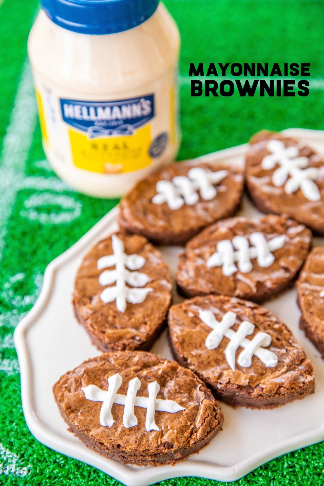 Mayonnaise Brownies - sounds weird, but they are SOOOO good!!! Hellmann's/Best Foods Mayonnaise, chocolate, butter, sugar, flour, baking powder, vanilla, eggs and chocolate chips. Can make a day in advance. Cut into football shapes for a delicious game day snack!