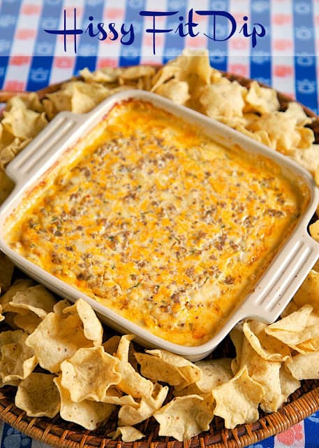 Hissy Fit Dip Recipe - sausage, sour cream, Velveeta, muenster, onion and garlic powder, Worcestershire sauce and parsley - SO good. You will definitely throw a hissy fit if you miss out on this dip! Crazy good! Can mix together and refrigerate a day before baking. Serve with chips and veggies! It is always gone in a flash!