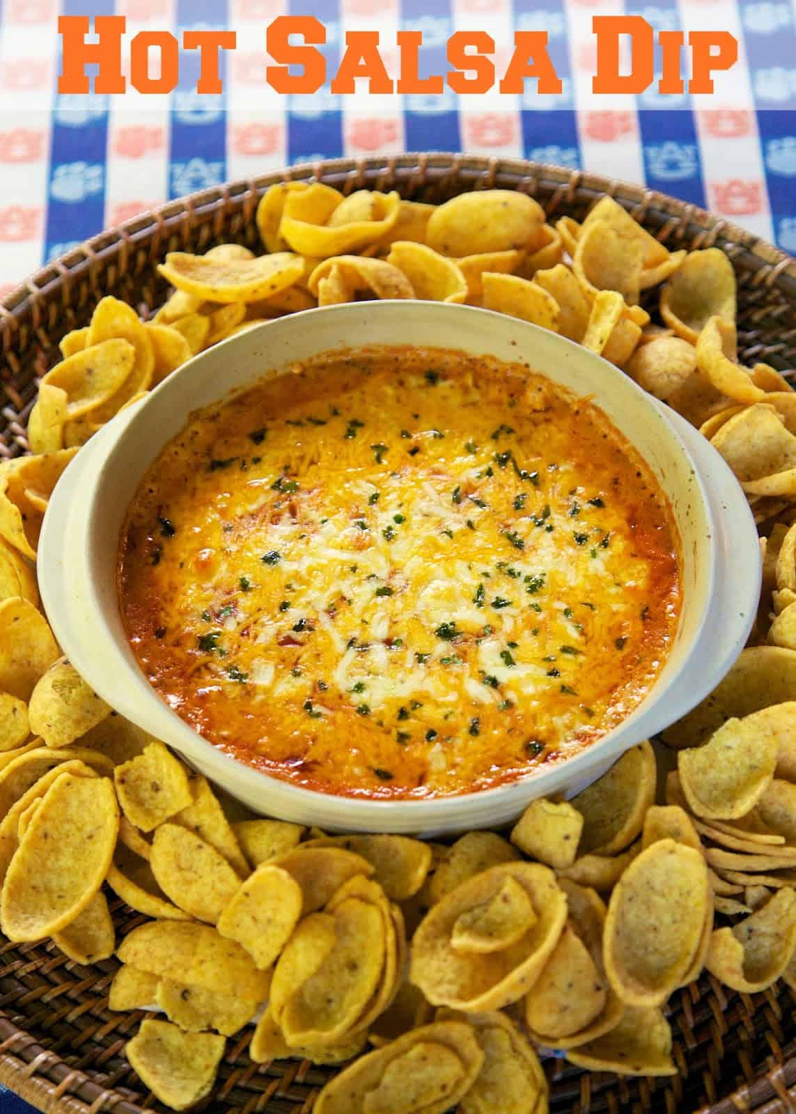 Hot Salsa Dip - only 4 ingredients! This stuff is AMAZING!!!! Cream cheese, taco seasoning, cheddar cheese and salsa. There are never any leftovers when I take this to a party! Make ahead of time and bake when ready to serve. Easy and delicious Mexican dip!!