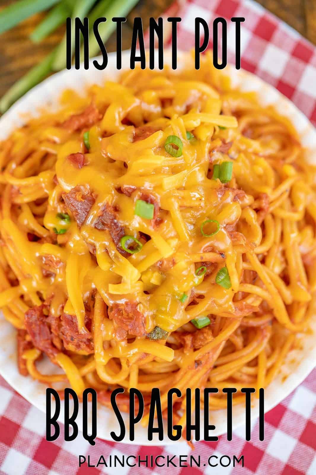BBQ spaghetti topped with cheese and green onions