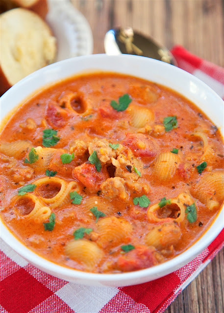 Italian Sausage Soup - ready in 30 minutes! Everything cooks in the same pot, including the pasta. Italian sausage, chicken broth, spaghetti sauce, cream cheese, pasta, oregano and basil. SO good! We ate this two days in a row. Serve with some crusty garlic bread for a complete meal!!