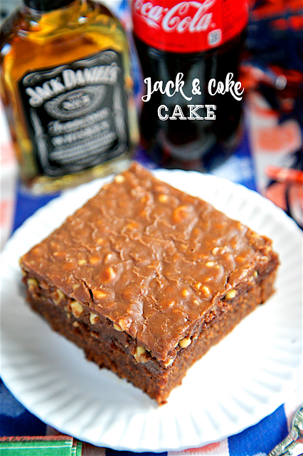 Jack and Coke Cake - our favorite drink in cake form! Homemade buttermilk chocolate cake and fudge frosting spiked with Jack Daniels. SO good! Great for a potluck and tailgate party!