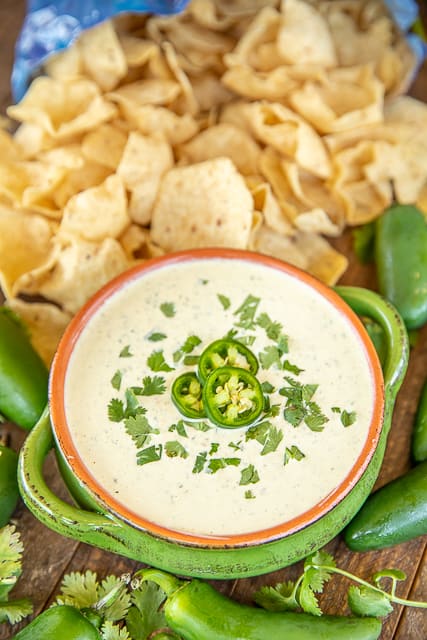 jalapeno ranch dip on a table with chips