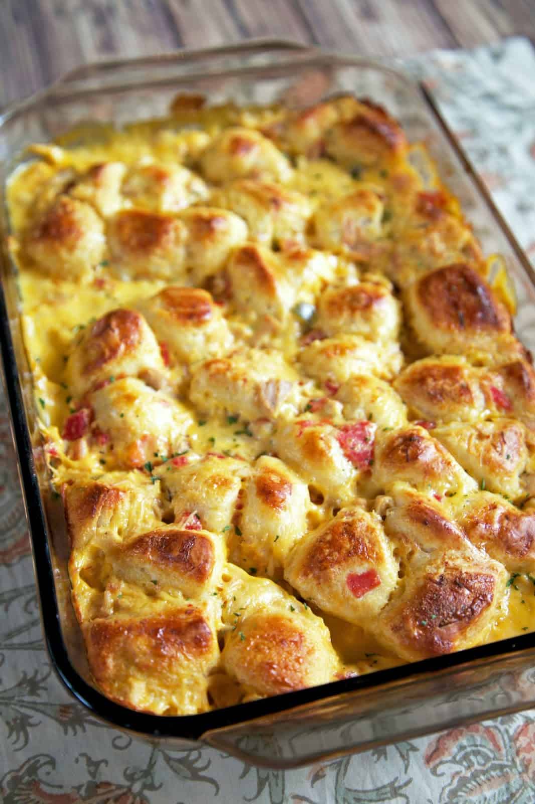 King Ranch Bubble Up Recipe - chicken, Velveeta cheese, Rotel, chicken soup tossed with chopped refrigerated biscuits and baked - use mild rotel if worried about the heat. OMG! SO easy and SO delicious! I wanted to lick my plate!