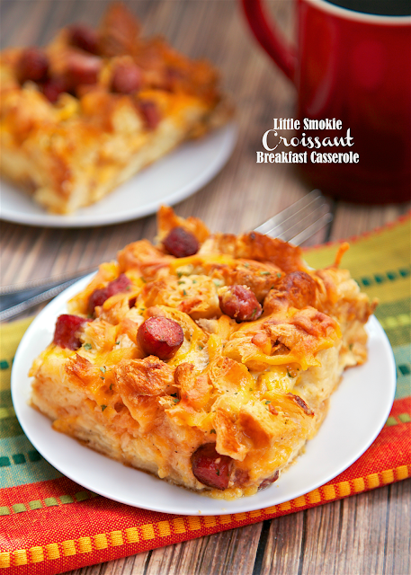 Little Smokie Croissant Breakfast Casserole - Buttery croissants, cheddar cheese, little smokies, eggs and milk. This casserole is assembled the night before and refrigerated overnight. Perfect for an easy weekday breakfast or overnight guests. We like to have this for dinner too! SO good! Everyone love this casserole!