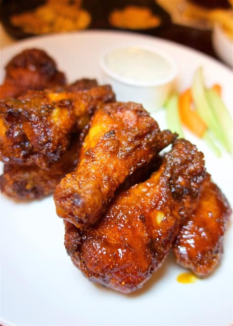 The Wings at Eight (Burger Bar and Sports Lounge) in the Ritz Carlton Amelia Island - THE BEST! Sweet and spicy in one bite.