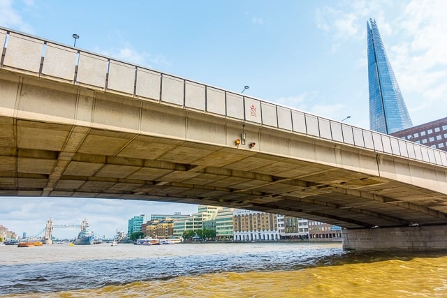 View of London Bridge from Thames River Boat - London, England